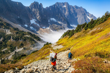 Backpackers Hiking Scenic Sahale Arm Trail at Cascade Pass