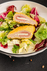 Cordon bleu cutlet meat dish French cuisine vegetable dish natural product tasty snack fresh delicious gourmet food background on the table rustic top view copy space