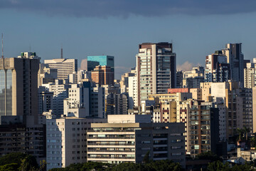 Fototapeta premium The exterior of modern condominiums is used full of glass, including sliding doors, windows and balconies. to avoid feeling cramped in Sao Paulo city