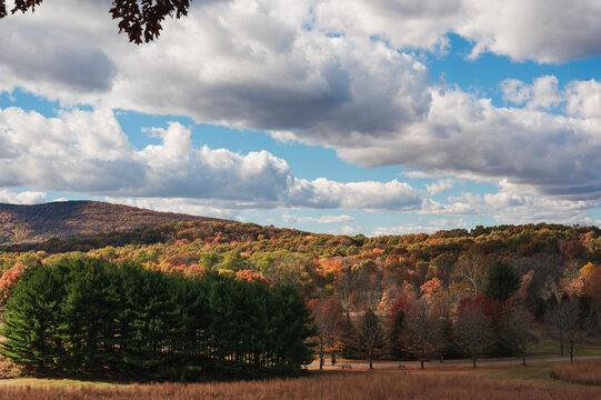 autumn landscape with mountains and blue sky
