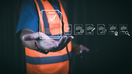 Engineer using digital checklist and document verification hologram for smart inspection, quality control, and industrial safety management in modern manufacturing and construction technology.