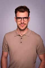 Studio shot of a handsome young man standing against isolated background with copy space