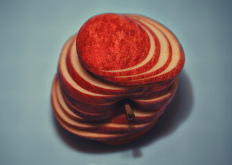 Closeup of apple with paprika emphasizing contrasting textures