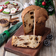 Chocotone, traditional italian cake panettone with chocolate chips over wooden table