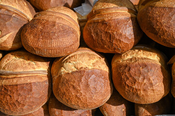 Fresh bread in the bakery. Close up of delicious bread for sale.