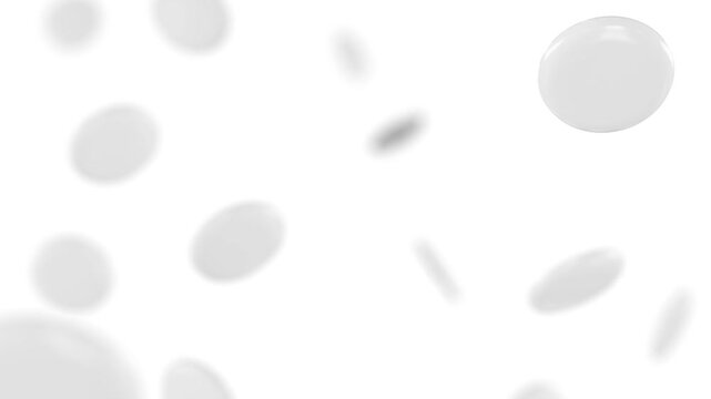 White round badge falling in slow motion, depth of field