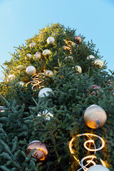 Festive Christmas Tree Decoration Against Clear Blue Sky
