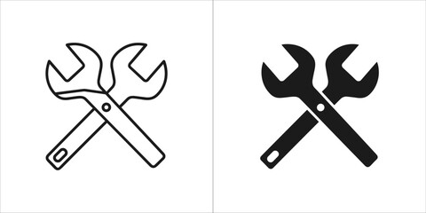 Two crossed wrenches, one outlined and one solid black