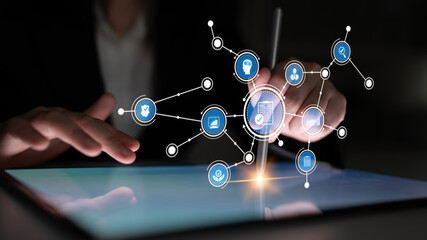 A professional interacts with a digital tablet, showcasing connectivity through various icons symbolizing technology, innovation, and modern communication methods. Tessel