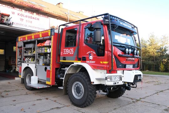 Kolbudy, Poland - 19 October 2025: Fire engine from  Voluntary Fire Service (Ochotnicza Straż Pożarna or OSP) in Kolbudy, Poland. The truck is an Iveco Eurocargo model, standing by fire station.