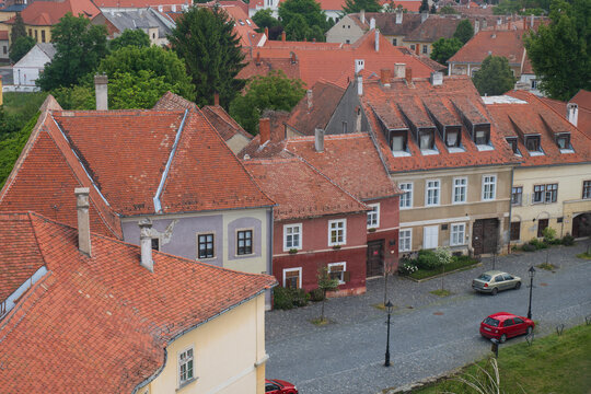 Historic European town with colorful houses and red roofs
