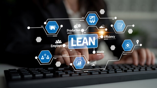 A business professional focuses on a keyboard while analyzing lean management strategies using digital interface elements, emphasizing efficiency and waste reduction. Tessel