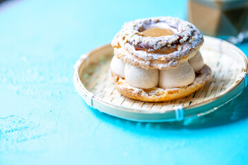 Close-Up of Pistachio and Pumpkin Christmas Paris-Brest Dessert
