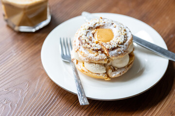 Close-Up of Pistachio and Pumpkin Christmas Paris-Brest Dessert
