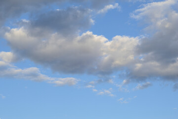Bright Blue Sky with Dramatic Gray and White Cumulonimbus Clouds