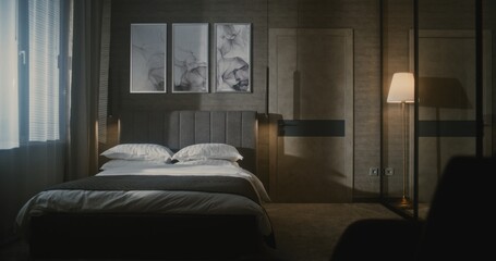 Obraz premium Elegant Mature Hotel Manager in Formal Suit Inspects Luxury Hotel Room, Using Tablet Photograph and Evaluate Bed Arrangement. Concept Hospitality Standards, Quality Control, Professional Management.