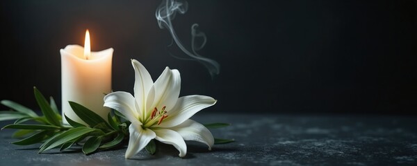 Candle burns with lily flower on dark table. Flame illuminates memorial service place. White blossom peace, condolence. Candlelight shows mourning. Concept of bereavement, loss in peaceful colors.