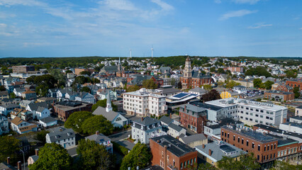 Beautiful buildings in Massachusetts small coastal town from drone 