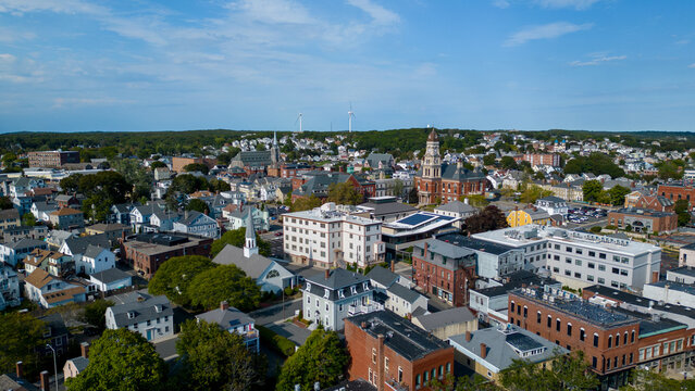 Beautiful buildings in Massachusetts small coastal town from drone 