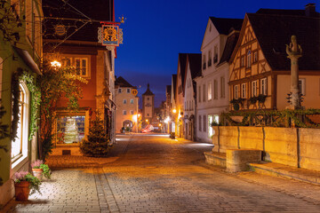 Fototapeta premium Medieval old town of Rothenburg ob der Tauber in Rothenburg, Germany decorated for Christmas during dawn