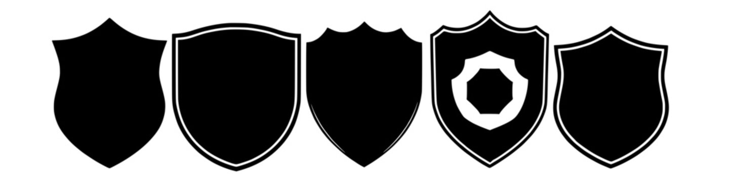 a monochrome collection of shield badge icons in varying shapes and designs. Illustration shield shape protection, black security and football badge