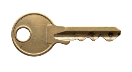 Close-up of brass key with grooves and round head on transparent background