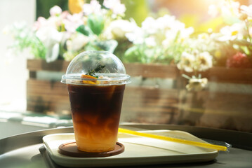 Refreshing Iced Drink with Citrus Garnish