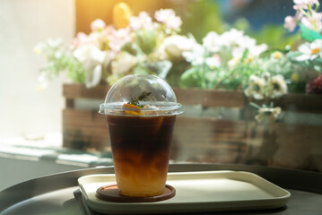 Iced Coffee in Clear Cup with Flowers