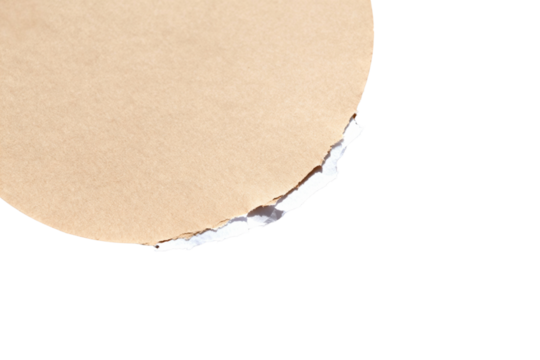 Round piece of torn brown craft paper with a ripped ragged edge isolated on transparent background