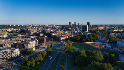 Tallinn's Modern Cityscape and Urban Infrastructure at Golden Hour, Aerial View