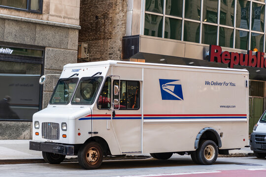 Chicago, Illinois, USA - October 08, 2024: USPS mail delivery truck. USP lorry postal service. Delivery truck courier company. Postal company USPS mail delivery truck