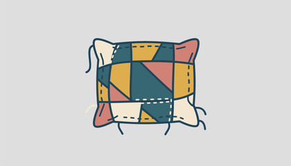 Obraz premium A collection of fabric scraps being sewn together to create a unique patchwork pillow cover.