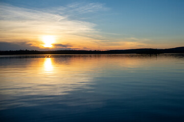 Fototapeta premium Sunsetting on Granite Hill Lake Ontario Canada 