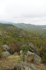 Mountain landscape panorama rocks stones trees forest Balkans autumn cloudy day nature