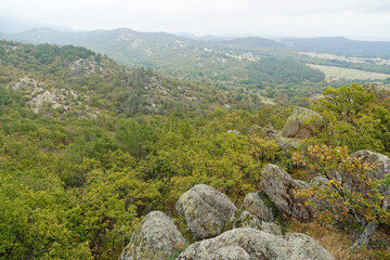 Mountain landscape panorama rocks stones trees forest Balkans autumn cloudy day nature 