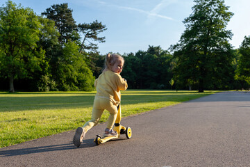 Preschool child scooter. Outdoor sport toddler. Fun play riding balance.