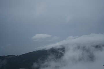 The mountains are covered in clouds.
