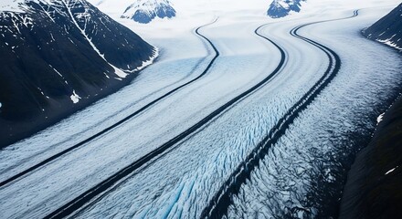 Majestic glacier flowing between mountains, Alaska.  Perfect for environmental awareness campaigns, climate change discussions, and adventure travel promotions. 