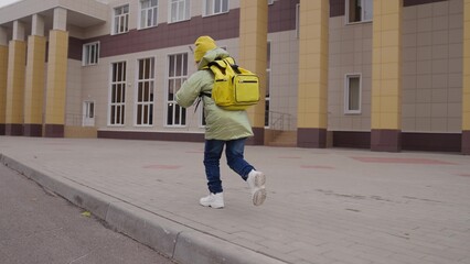 little girl run through the schoolyard to class, child rushing school building with school bag, happy running kid, elementary school student, love to learn getting knowledge, runner schoolgirl morning