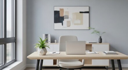 Modern home office interior with light wood desk and laptop.