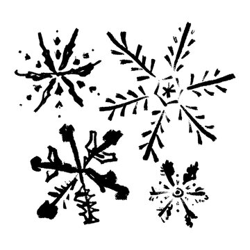 Set of New Year brush stroke or chalk ornate texture snowflakes icons, Christmas patterned black brush hand-drawn isolated elements on white background. Scandinavian Norwegian simple winter print