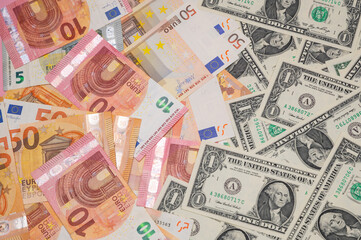 Currency from different countries placed together on a surface