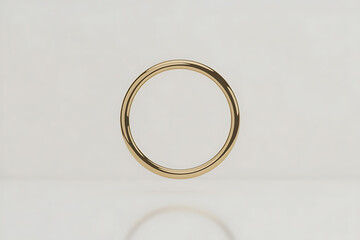 A simple, elegant gold ring against a soft, neutral background, conveying timelessness.