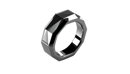 Faceted ring casting dramatic shadows against a black background, showcasing its geometric design and shiny metallic texture
