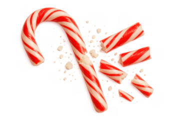 Broken candy cane pieces and crumbs scattering on transparent background, symbolizing fragility and holidays