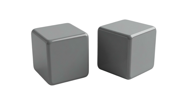 Two grey cubes stand side-by-side on a dark background, illuminated by a single light source