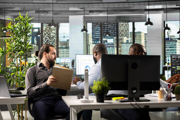 Professional workers focusing on performance metrics and data visualization, forecasting and developing a new strategy and studying market. Colleagues share projections for progress.