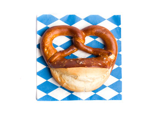 pretzel on a cage on a white background