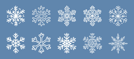 Hand-Drawn Grunge Snowflake Set on Blue Background. Sketch collection of ten unique white snowflakes with a hand-drawn grunge style on blue. Ideal for winter, holiday, or festive. Vector graphic set