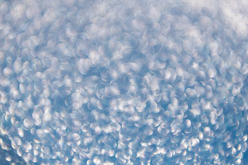 Blur glitter backdrop. Glitter shimmer background. Defocused shimmer. Bokeh backdrop shimmer. Bokeh effect. Glitter shine. Bokeh shimmering background. Blurred defocused background. Glitter dust